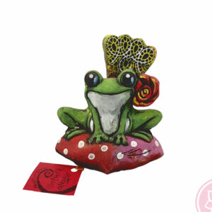 Figura de una rana flamenca con peina y flor. Esta pieza de cerámica es obra original del artista gaditano Antonio Ruano.